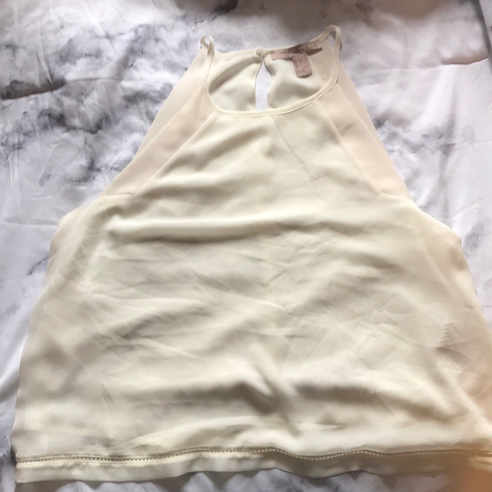Cream colored Roman neckline string tank top